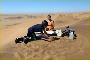 Preparing for sand boarding