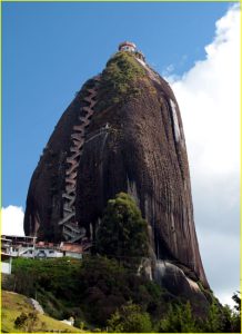 200 m tall granite monolith Piedra del Penol (Guatape) near Medellin