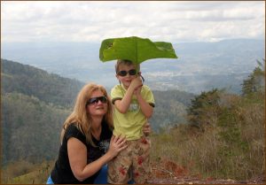 With a "poor's man umbrella"