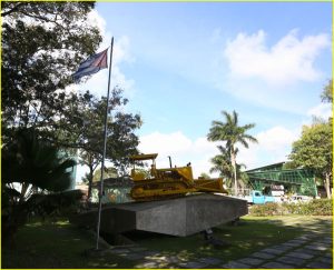 Bulldozer used to accomplish the derailment at its honorary spot at the Boxcar Museum, Santa Clara