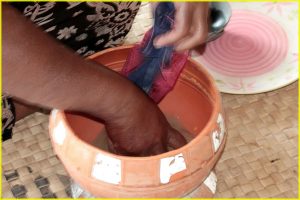 Preparing mildly relaxing/hallucinogenic drink from kava root, Yalobi village, Waya island in Yasawa archipelago (Fiji)