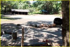 Main square in Ireupuow village, Tanna, Vanuatu with table with half-shells of coconut (bilo) for drinking kava
