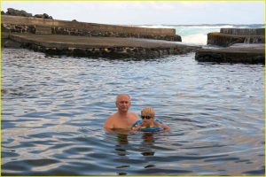 Taking a dip in The Hot Pond in Alahanui Beach Park, The Big Island