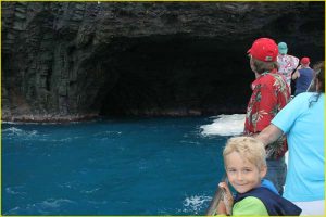 Inspecting a sea cave off Napali Coast, Kauai