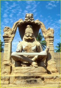 16th century monolith statue of Narasimha (Vishnu in half man-half lion incarnation) in Hampi, Karnataka
