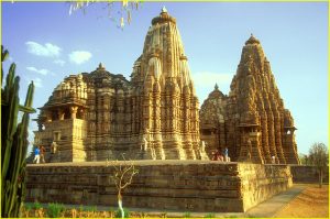 Devi Jagadamba (foreground) and Kandaria Mahadev Temples from Chandela period (9-11th century), an UNESCO site, in Khajuraho, Madhya Pradesh