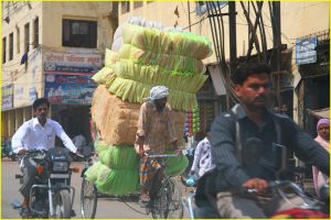 Rickshaw driver with a load