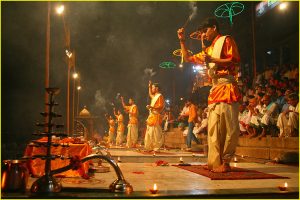 Ganges riverbank ganga aarti ceremony with puja (worship or hindu mass), fire show and dancing at Dasaswamedh Ghat in Varanasi, Uttar Pradesh