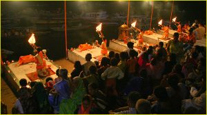 Ganges riverbank ganga aarti ceremony with puja (worship or hindu mass), fire show and dancing at Dasaswamedh Ghat in Varanasi, Uttar Pradesh