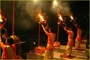 Ganges riverbank ganga aarti ceremony with puja (worship or hindu mass), fire show and dancing at Dasaswamedh Ghat in Varanasi, Uttar Pradesh