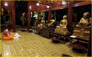 Monk meditating in Wat Phra Singh, Chiang Mai, Thailand