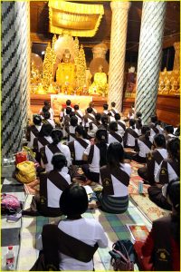 Organized group in Shwedagon Pagoda, Yangon, Myanmar