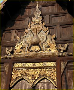 Gilded pelmet over entrance to Wat Phan Tao, Chiang Mai, Thailand