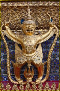 Garuda (half-man, half-bird) with serpents in Wat Phra Kaew (Kaeo, or Emerald Buddha), Bangkok
