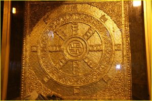 Gilded inside walls of Botataung Paya with ancient swastika motif, Yangon, Myanmar