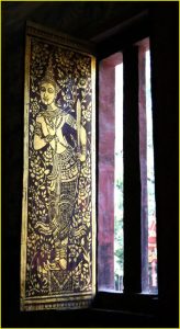 Window shutter in Wat Phra Singh, Chiang Mai, Thailand