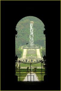 Gardens of Palazzo Reale seen through entrance gate, Caserta near Napoli