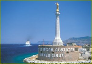 Entrance to Messina harbor with statue of Madonnina Port Protectress, Sicily