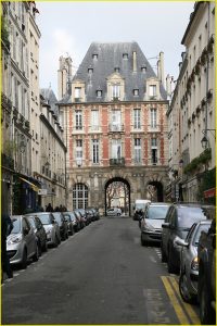 On a street leading to Place des Vosges