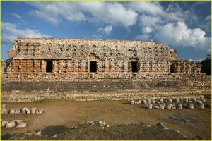 Facade of el Palacio de los Mascarones covered in hundreds of Chac masks, Kabah